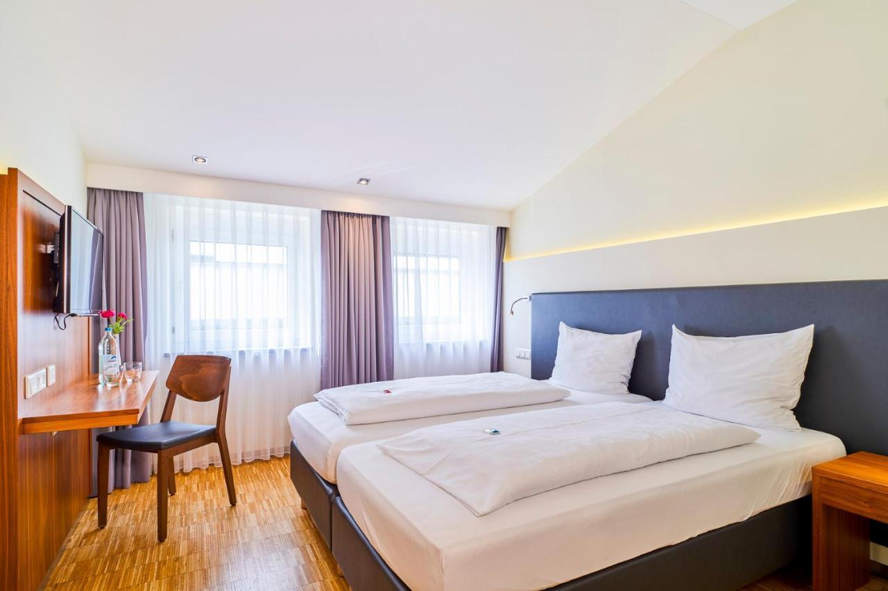 Hotel Apfelbaum Erding Bagian luar foto